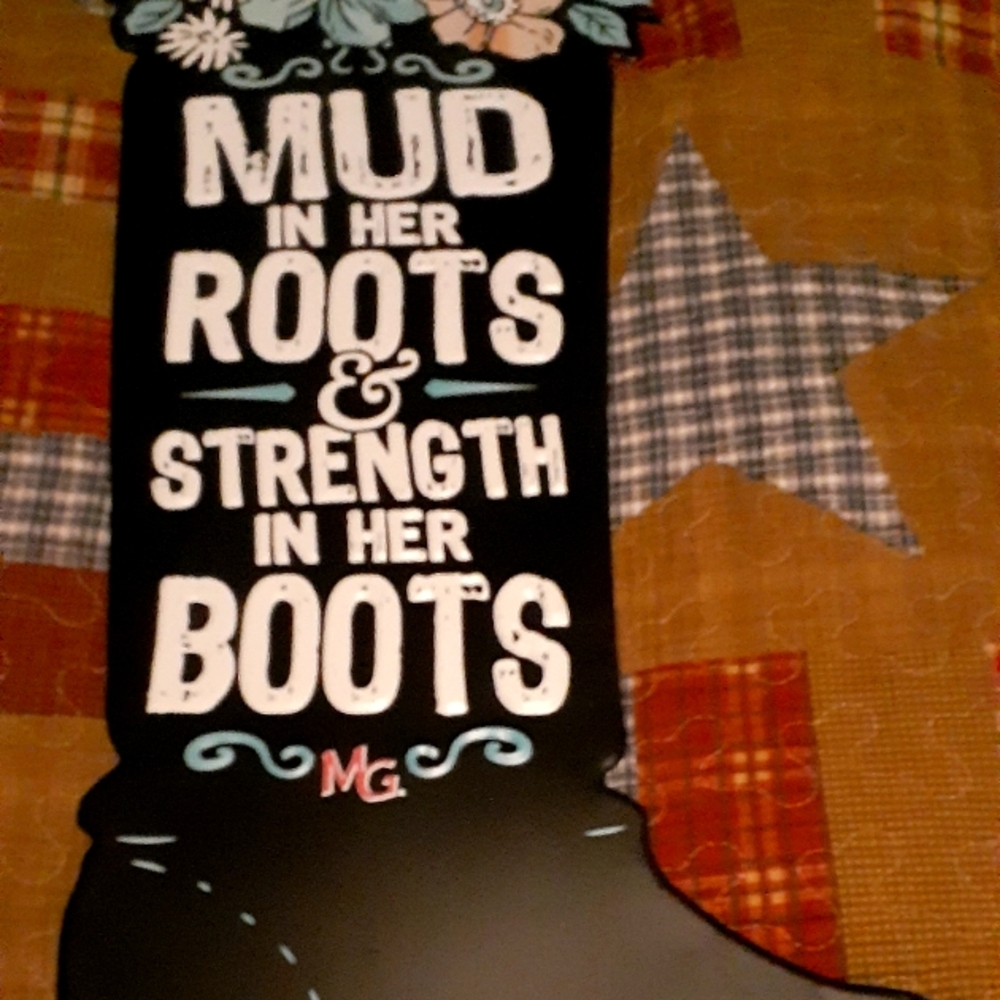 Muddy girl boot sign